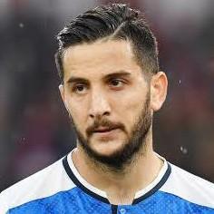 K. MANOLAS