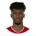 K. Coman