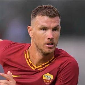 E. DZEKO
