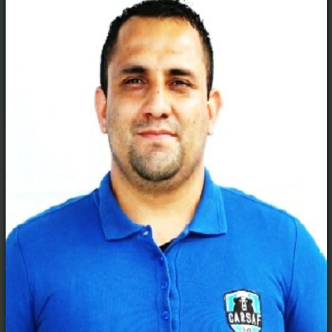 *Juan Carlos Santos Puga