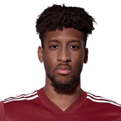 K. Coman