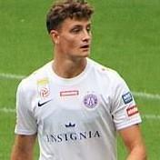 E. Martel