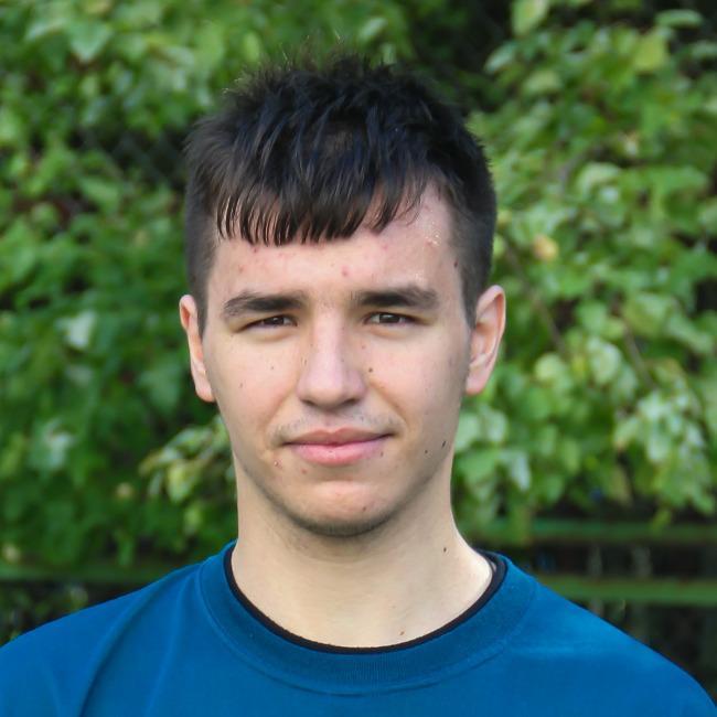 Максим Николаев