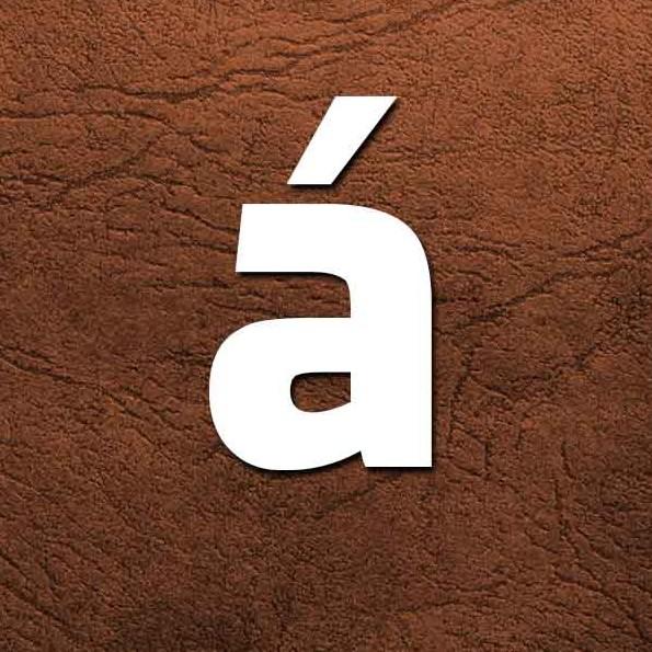 Á
