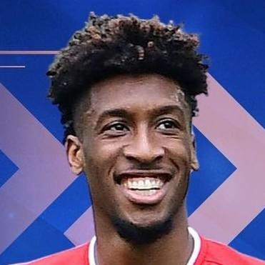 K. Coman