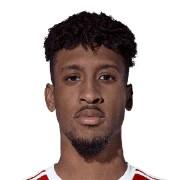 K. Coman