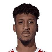 K. Coman