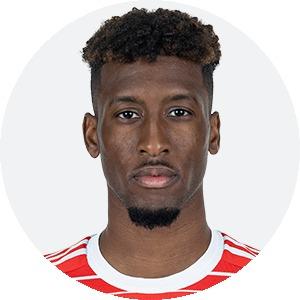 K. Coman