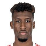 K. Coman