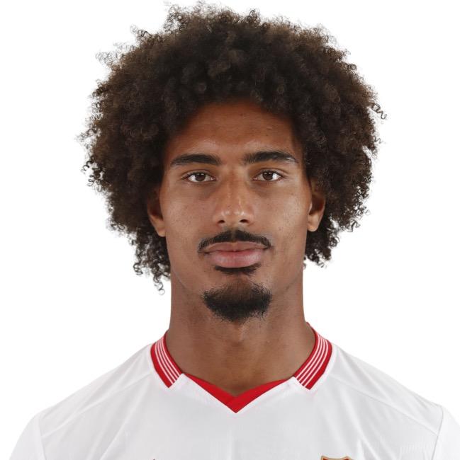L. Badé