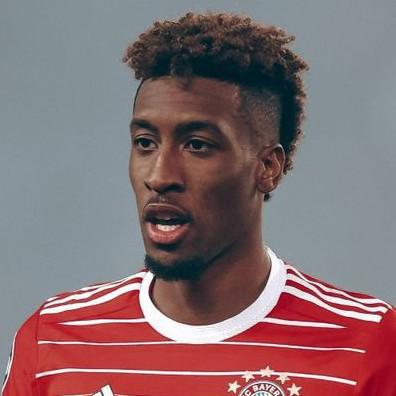 K. COMAN