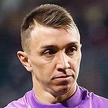 Fernando Muslera (captain)