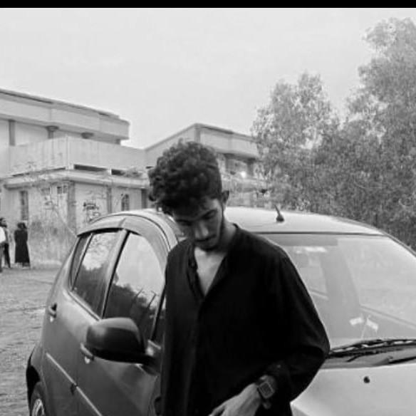 Adil K