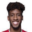 K. Coman